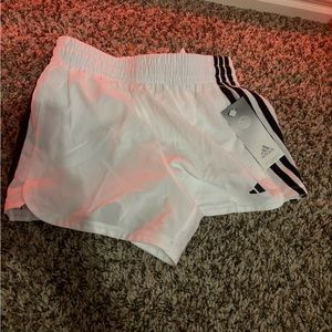 white adidas shorts